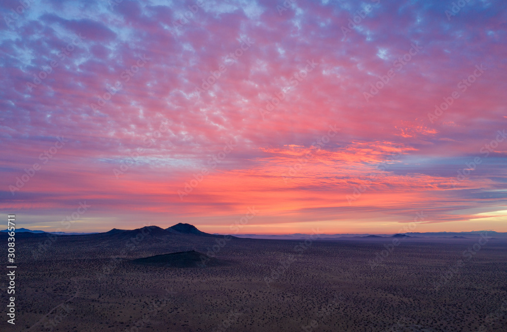 aerial view of a fiery sunset in the mountains