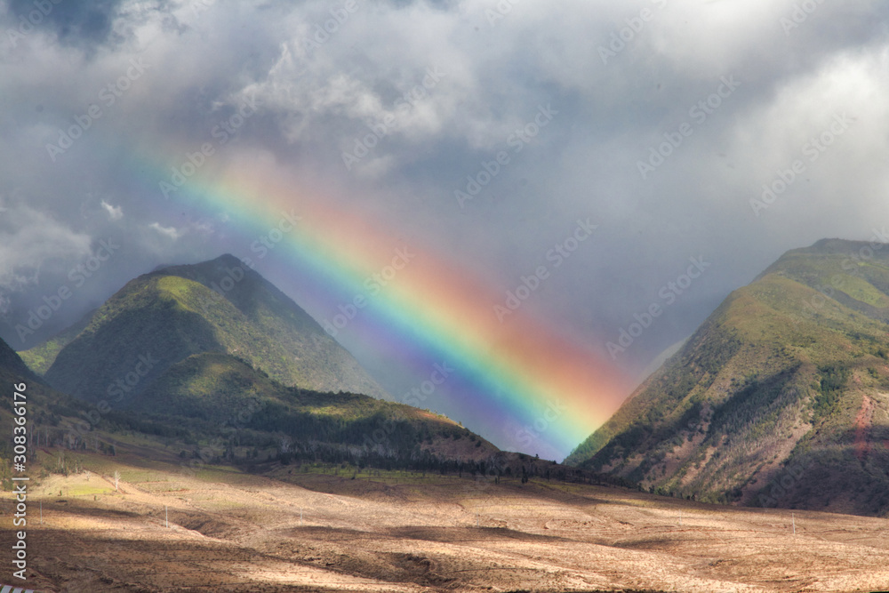Stunning rainbow over the West Maui mountains.