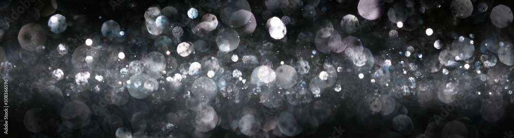 Blurry bokeh of shiny silver lights and glitter abstract Blurry bokeh of shiny silver lights and glitter abstract