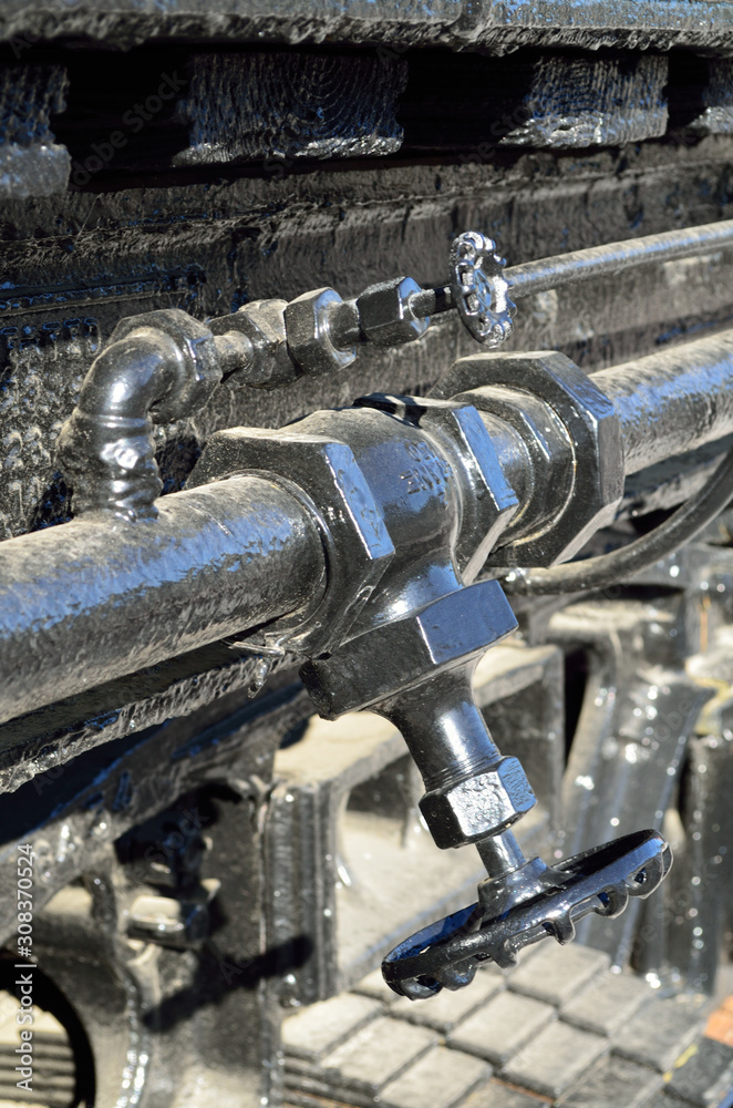 Fototapeta premium Pipes and valves on train engine
