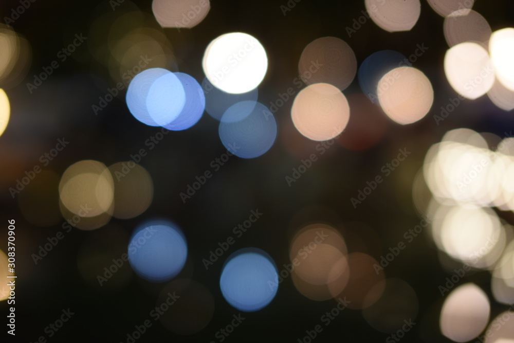 The beautiful bokeh of the lights in the garden at night. The beautiful bokeh of the lights in the garden at night.
