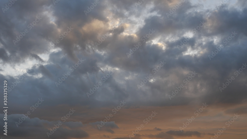 White cotton candy and Cumulus clouds on tropical blue sky at sunset, The horizon began to turn orange with purple and pink cloud at night, Dramatic cloudscape area White cotton candy and Cumulus clouds on tropical blue sky at sunset, The horizon began to turn orange with purple and pink cloud at night, Dramatic cloudscape area
