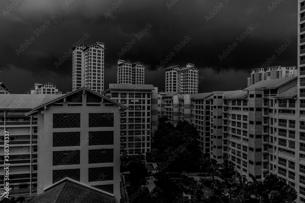 Dark clouds looming over housing apartments