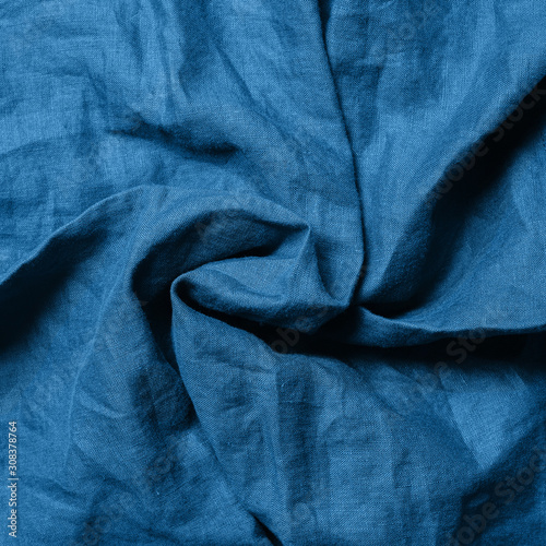 Abstract textured background made of classic blue 2020 color. Color of year 2020 linen textile backdrop. COY2020 concept. Copy space for text