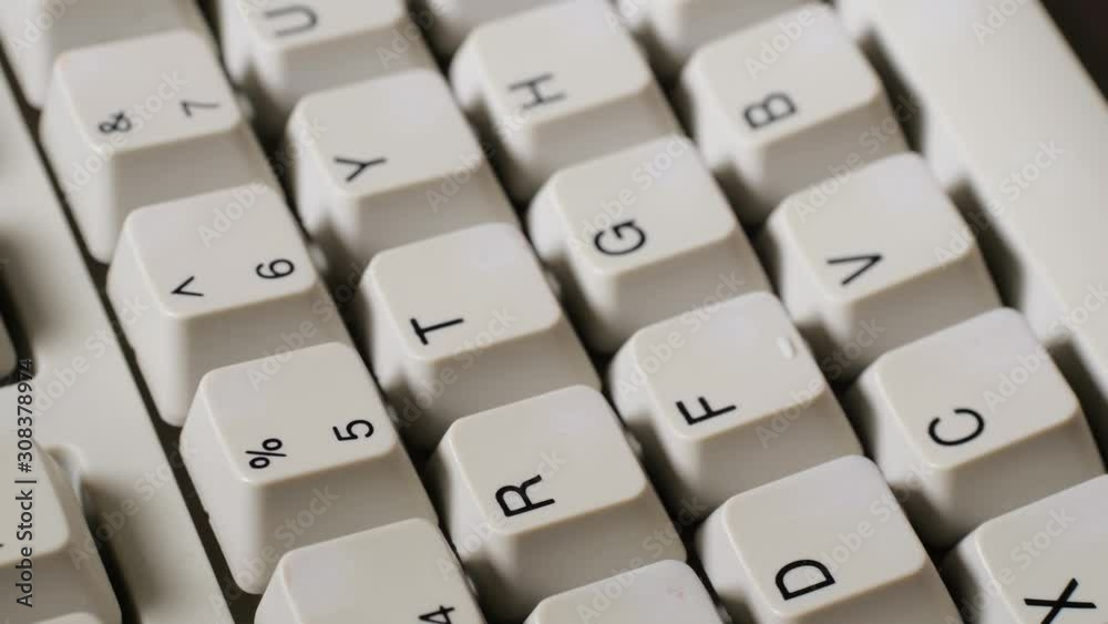 Finger presses nomber 5 or % button on keyboard Finger presses nomber 5 or % button on keyboard