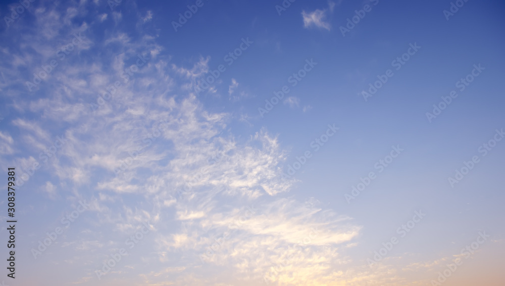 Blue sky and soft clouds background