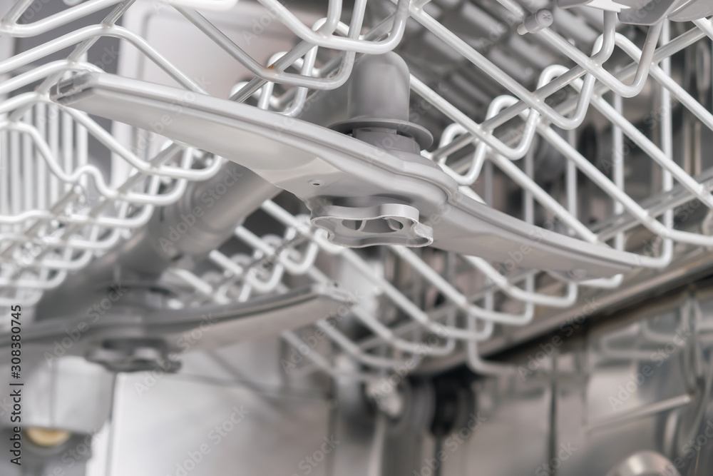 photo of the dishwasher, inside view of the grid photo of the dishwasher, inside view of the grid