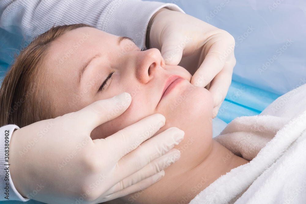 facial massage, spa skin care in a beauty salon facial massage, spa skin care in a beauty salon