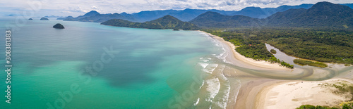 Aerial view panorama of Green Coast shoreline with turquoise water, beach, river and green mountains, Brazil