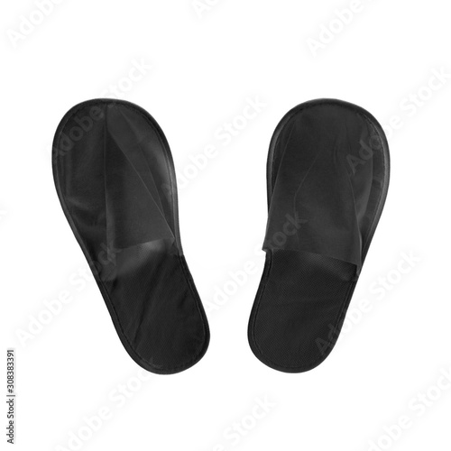 Black house slippers. Isolated on white background. Close up