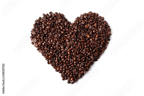 Heart of coffee beans background isolated on white background. Top view. 