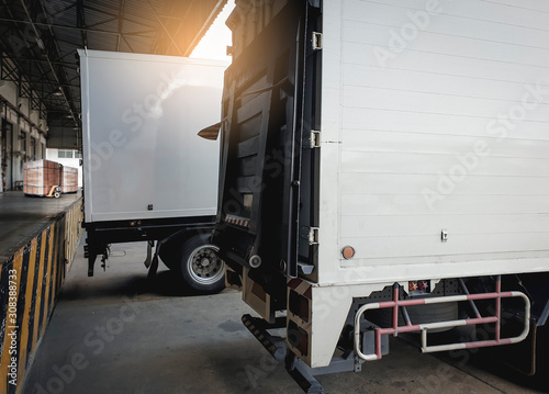 Photography The truck container docking load shipment goods at warehouse, freight industry delivery logistics and transport