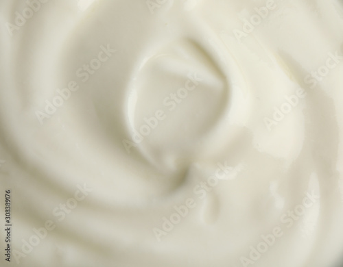 Tasty organic yogurt as background, top view