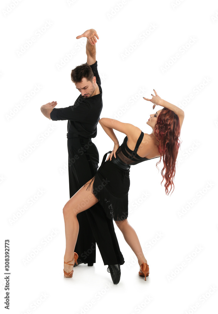 Fototapeta Passionate young couple dancing on white background