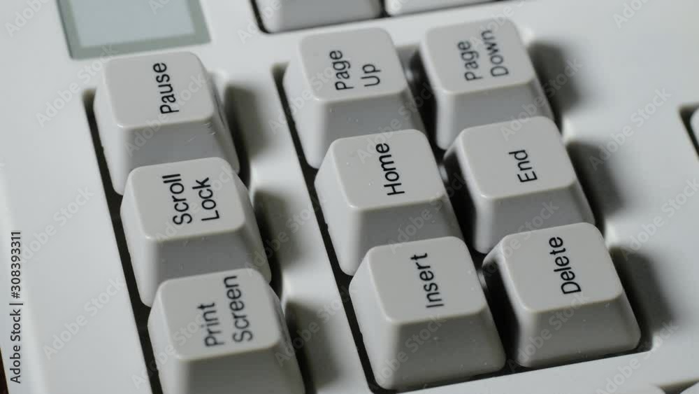 Finger presses SCROLL LOCK button on keyboard Finger presses SCROLL LOCK button on keyboard