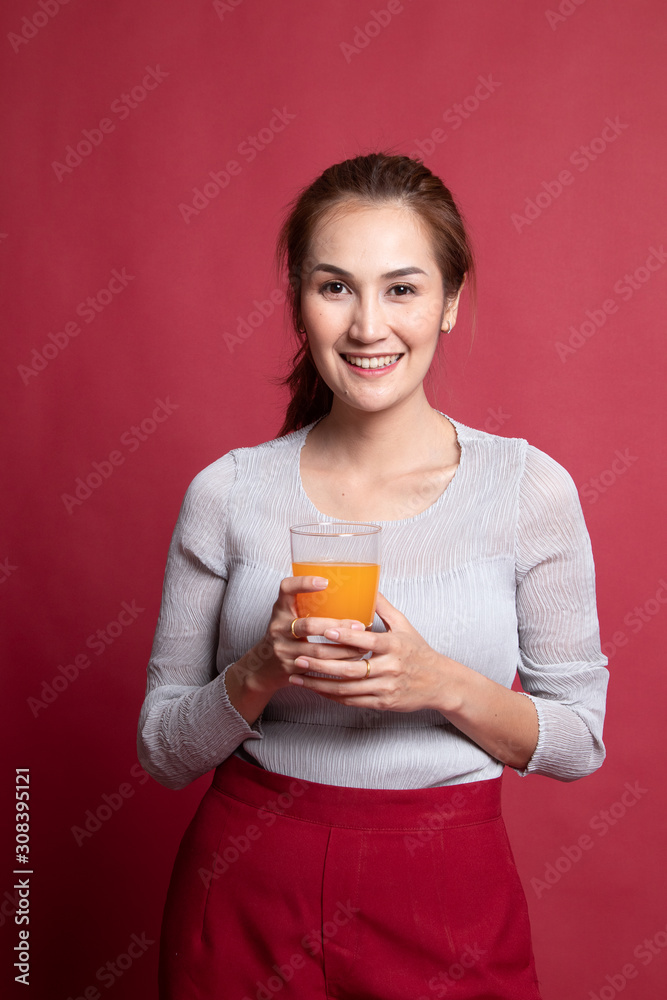 Young Asian woman drink orange juice. Young Asian woman drink orange juice.