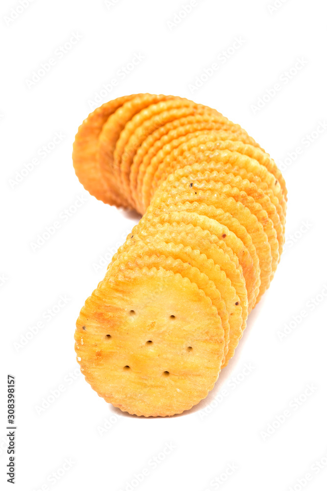 A stack of round crackers isolated on white background. A stack of round crackers isolated on white background.