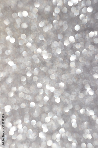 Silver glitter texture background, sparkling Christmas wallpaper.