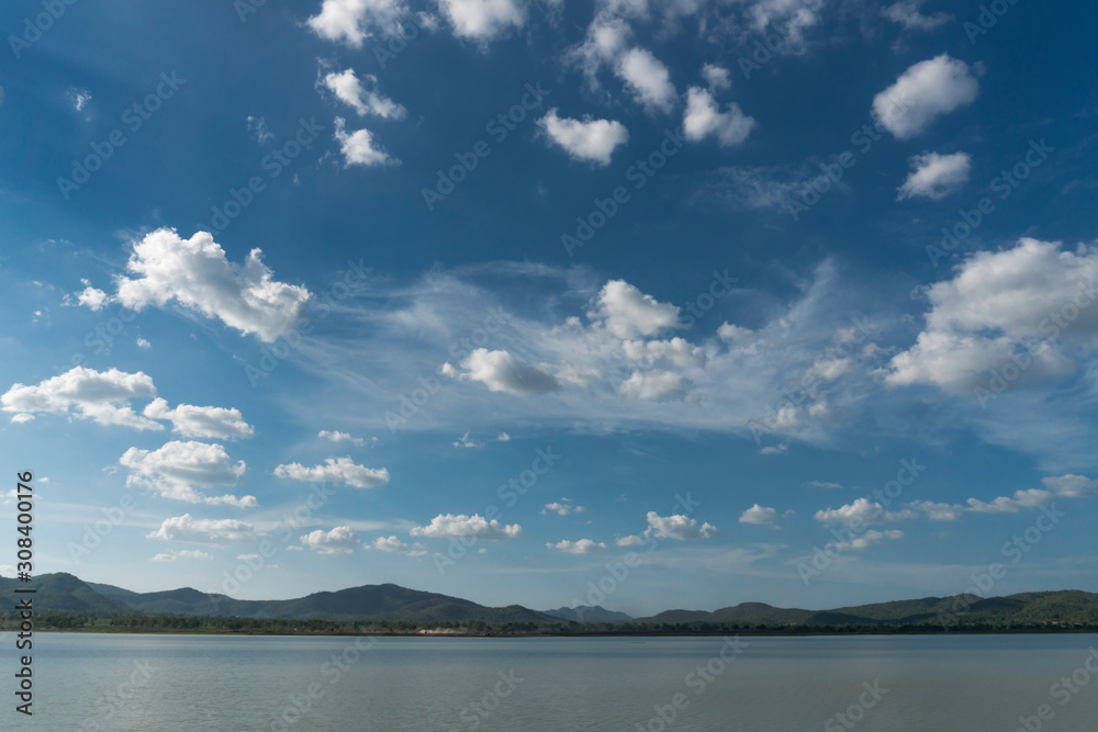 The blue sky view of the rural reservoir