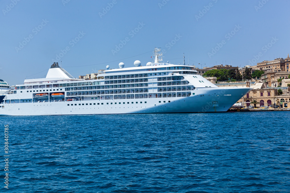 A modern syperyacht in the port on sunny day, Malta