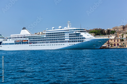 A modern syperyacht in the port on sunny day  Malta