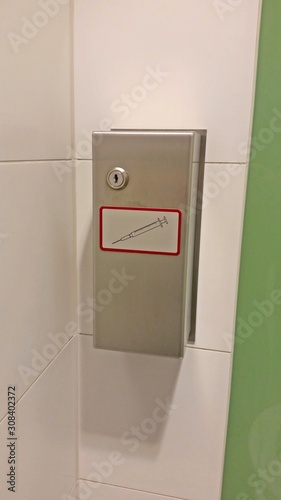Syringe disposal unit, Needle disposal in public toilet.