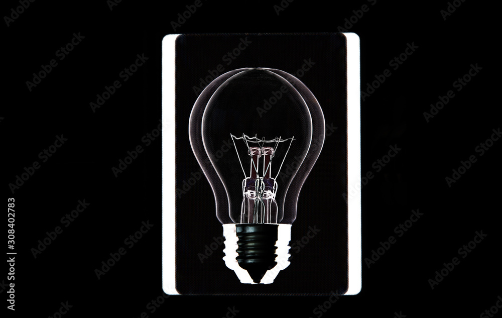 Lamp bulb on the white and black background. New idea concept. Lamp bulb on the white and black background. New idea concept.
