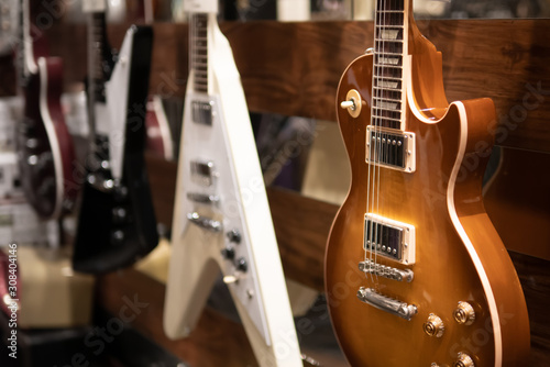 Electric guitar hanging on the wall