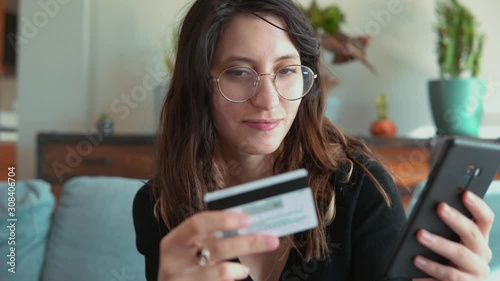 Online banking with smart phone.  Easy pay using smart phone. Communication via app for sale in shop. Woman shopping online with credit card.