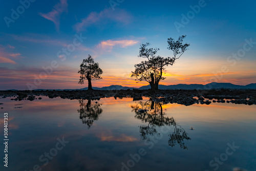 sunset on lake © Thanunchakorn