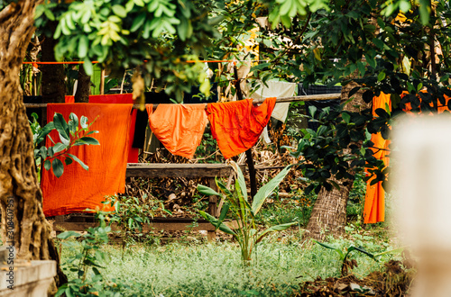 laundray day in the backyard, the traditional monk cloth  photo