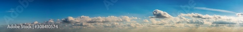 Fototapeta Naklejka Na Ścianę i Meble -  Fantastic soft clouds against blue sky, natural composition - panorama