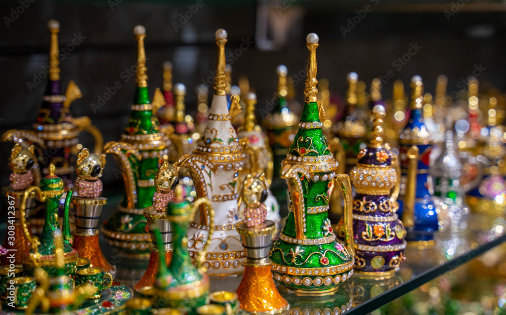 colorful teapots on market