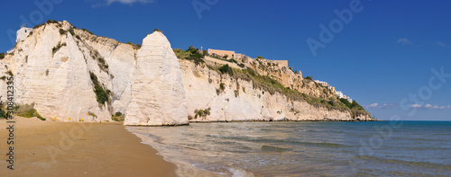 Panoramic view of a white rock by the sea. Vieste, Italy.