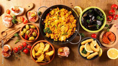 assorted of spanish food, tapas, paella, mussel,olive photo
