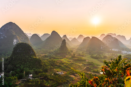 Принти на полотні Golden sunrise over karst mountain peaks, Li River valley, Yangshuo, Guilin, Gua
