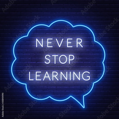 Never stop learning. Neon sign on a dark background .