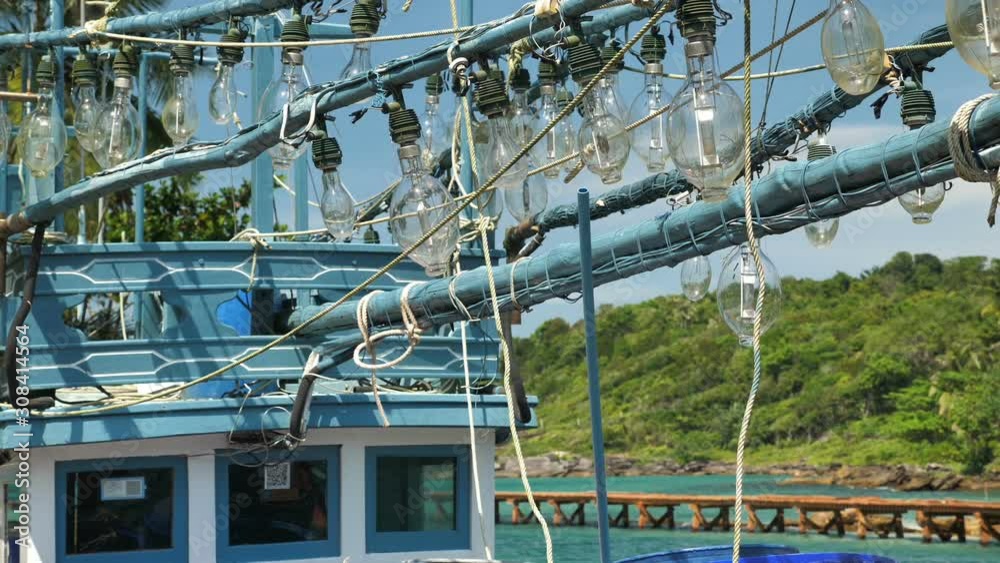 Bulbs for night fishing of squid, shrimps, on the island of Koh Kood, Thailand Bulbs for night fishing of squid, shrimps, on the island of Koh Kood, Thailand