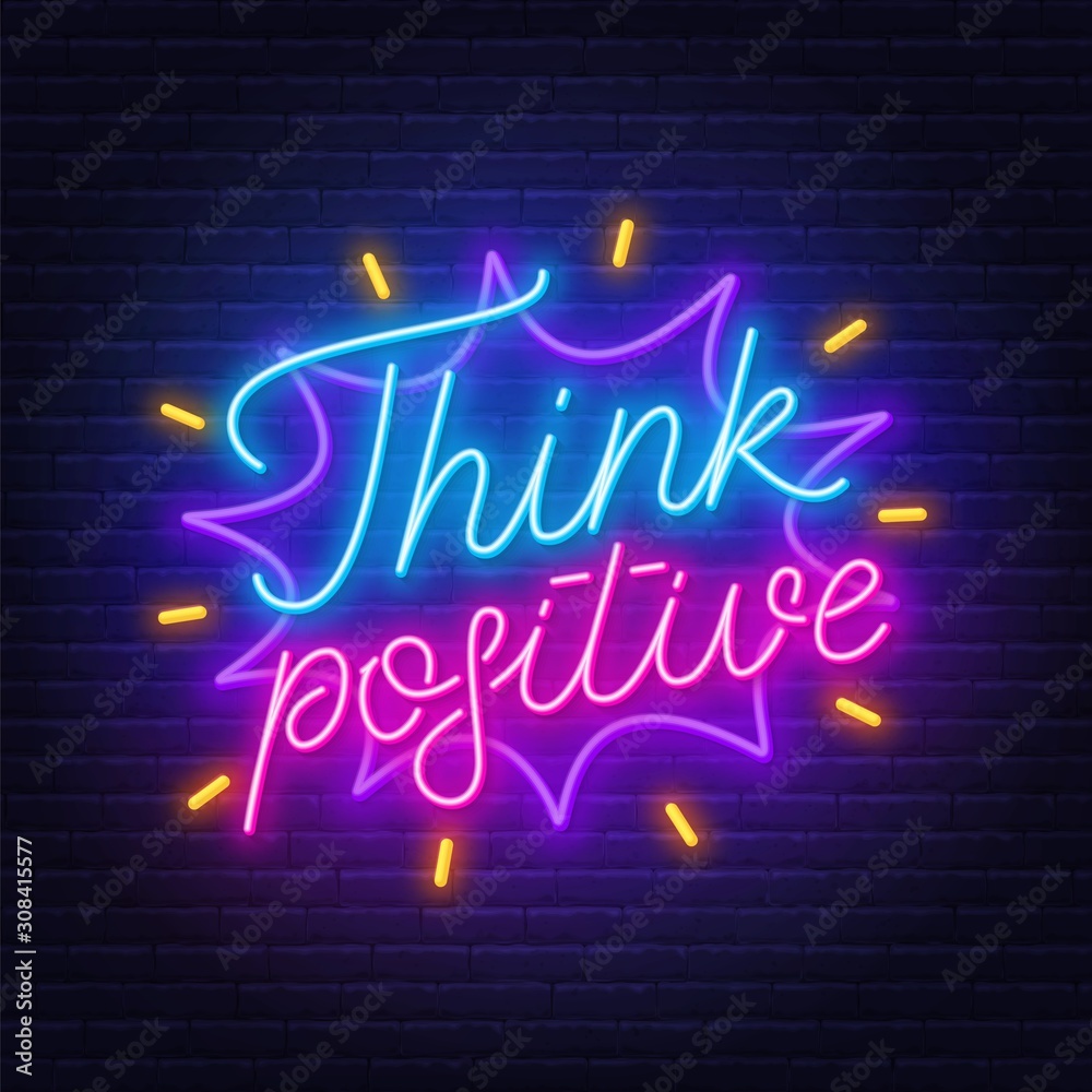 Think positive neon lettering on brick wall background . Think positive neon lettering on brick wall background .