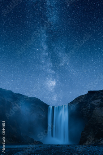 Fototapeta Naklejka Na Ścianę i Meble -  Waterfall at night under a beautiful milky way