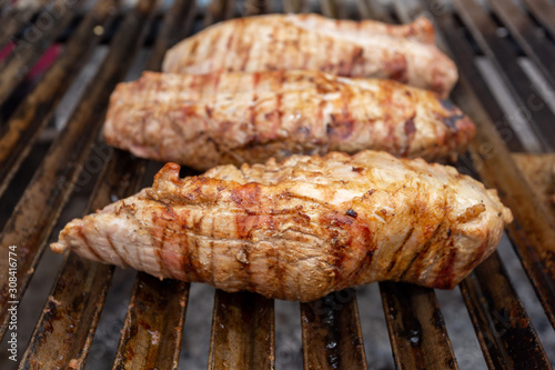 winter processing pork meat bacon cotechini zamponi and sausage photo