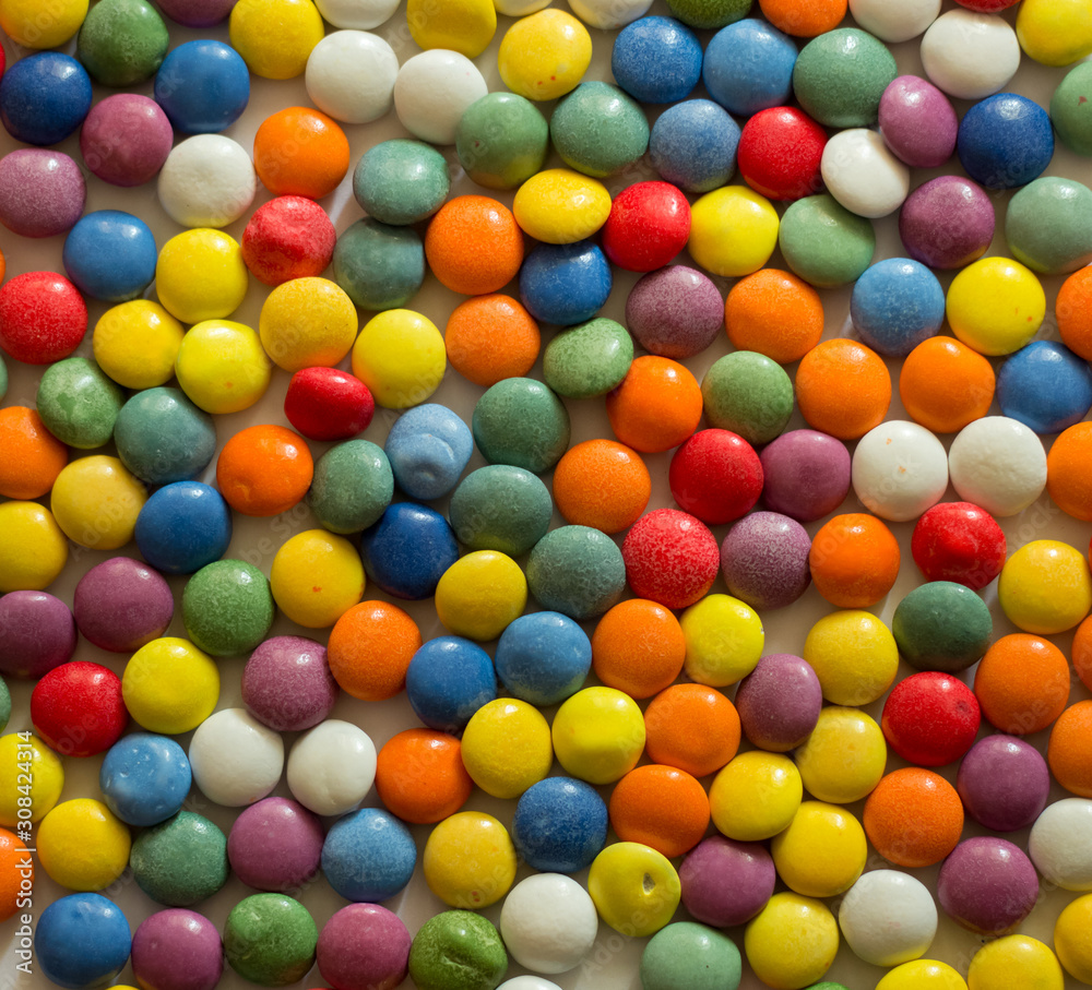 Fototapeta premium Multi-colored chocolate dragee Texture.