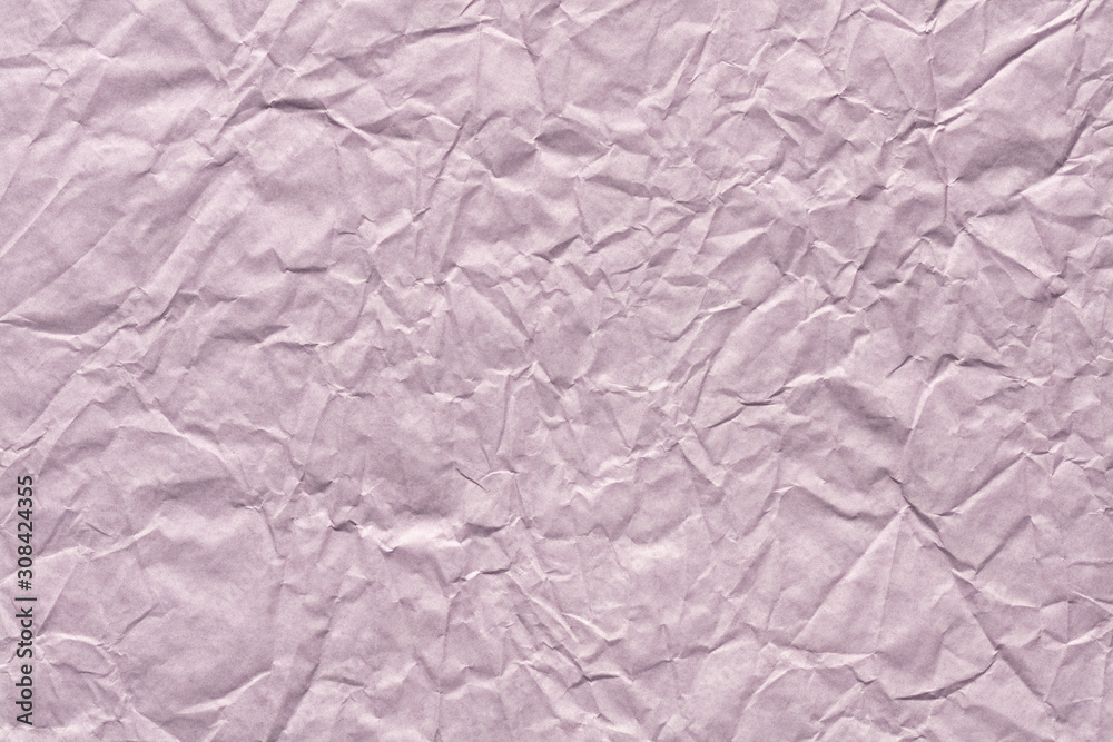 Fototapeta premium Crumpled paper background in gentle lilac color as part of new greeting card.