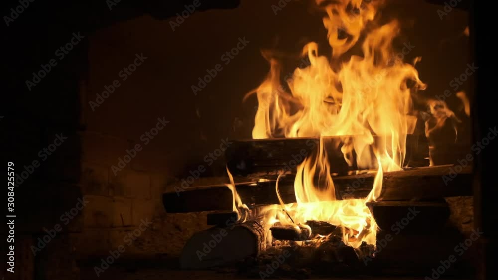 Fireplace stove, burning logs, slow motion