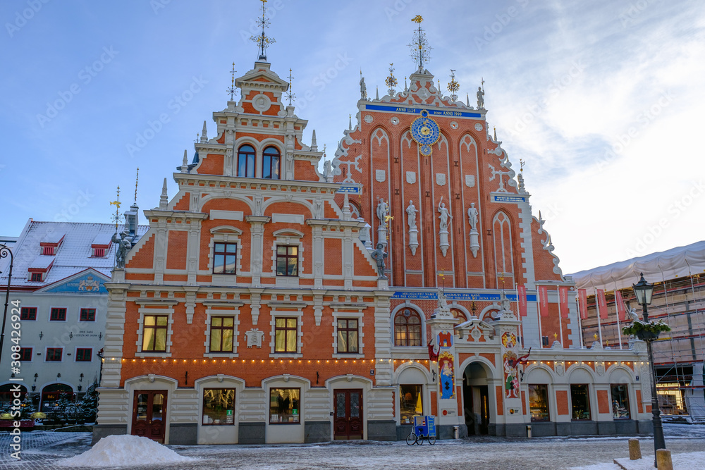 Riga / Latvia - 01 December 2019: House of the Blackheads on City Hall Square in Riga, Latvia. Winter sunny day, Christmas, holidays.