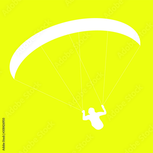 silhouette paraglider or parachutist in flight