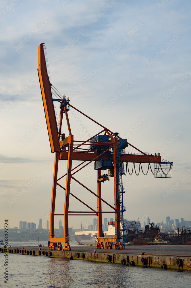 large port crane in the evening at sunset. industrial architecture of Istanbul