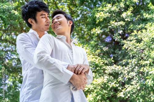 Portrait of Asian homosexual couple hug and sweet moment of love.Concept LGBT gay.