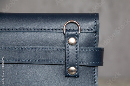 close up of blue leather women handbag. Horizontal orientation.