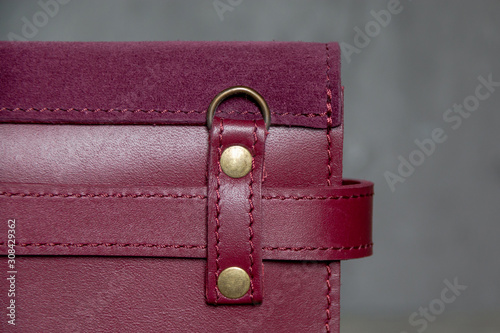 close up of red leather women handbag. Horizontal orientation.